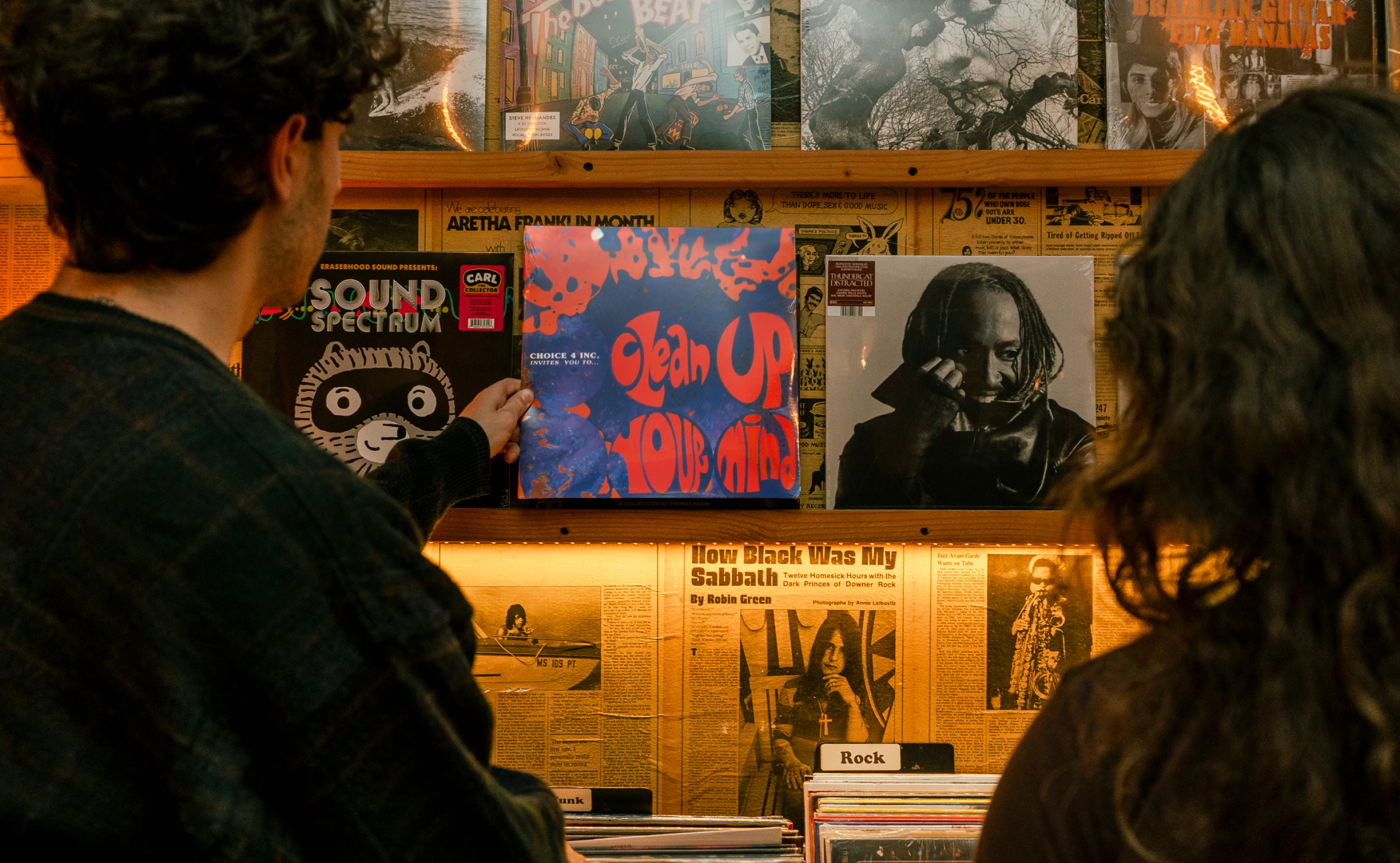 Clean Up Your Mind album held in a record shop