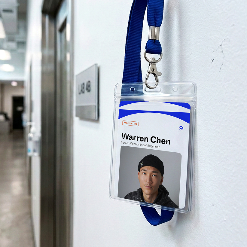 Branded lanyard badge on a wall